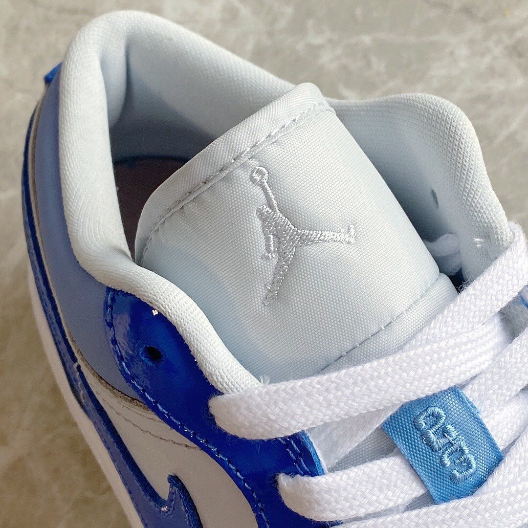 Air Jordan 1 Low “ Mighty Swooshers “